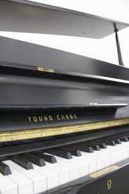 Photo : Propose à vendre Piano droit YOUNG CHANG - U107